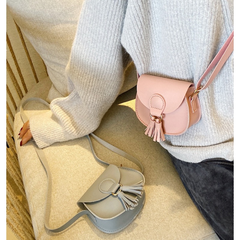 حقيبة أطفال صغيرة بتصميم خطاف  - مراجعة Mini Backpack Purse وسعره