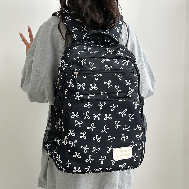 حقيبة ظهر بطبعة فيونكة لطيفة م - مراجعة Sling Backpack Shoulder وسعره